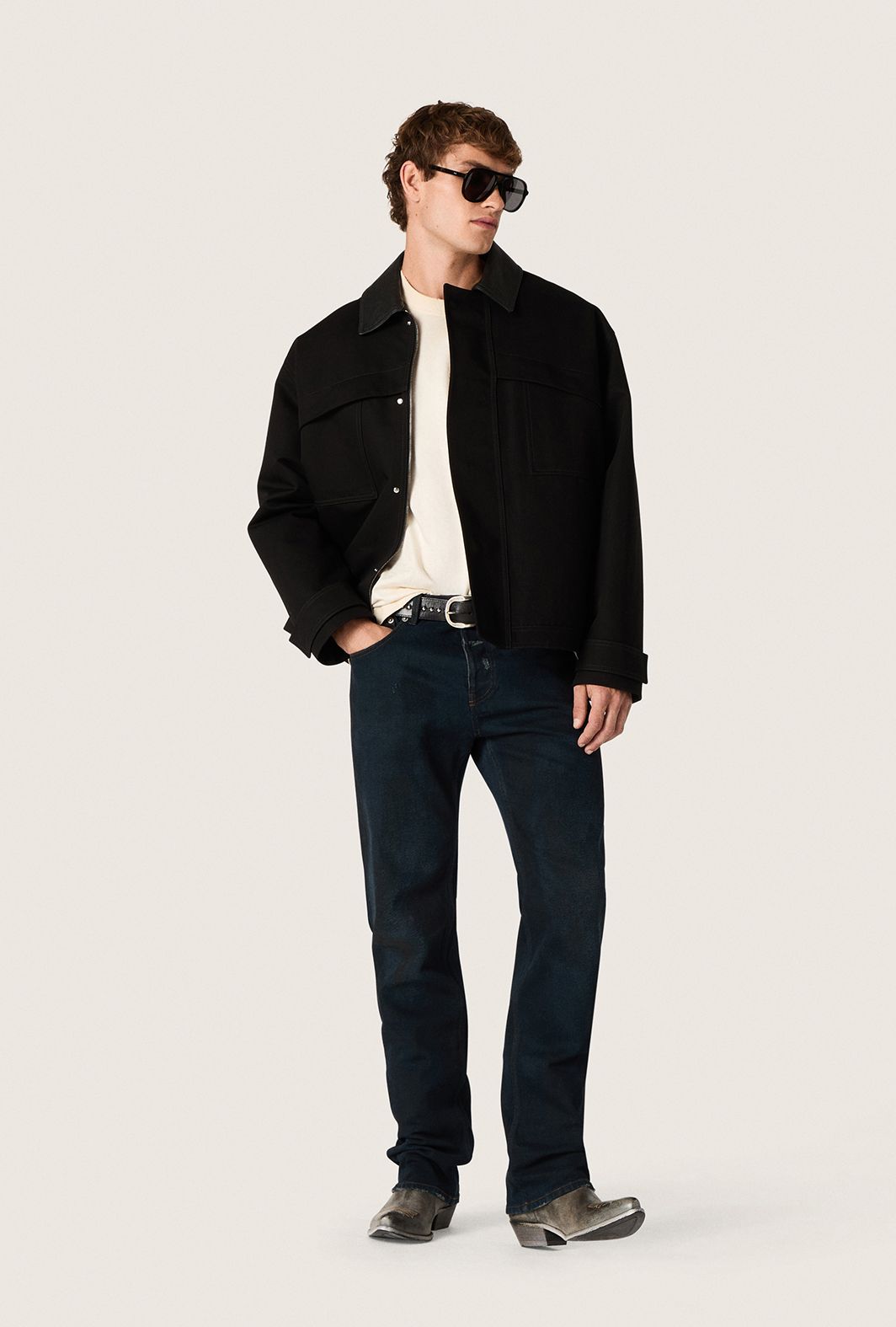 male-model-wearing-black-jacket-and-pants